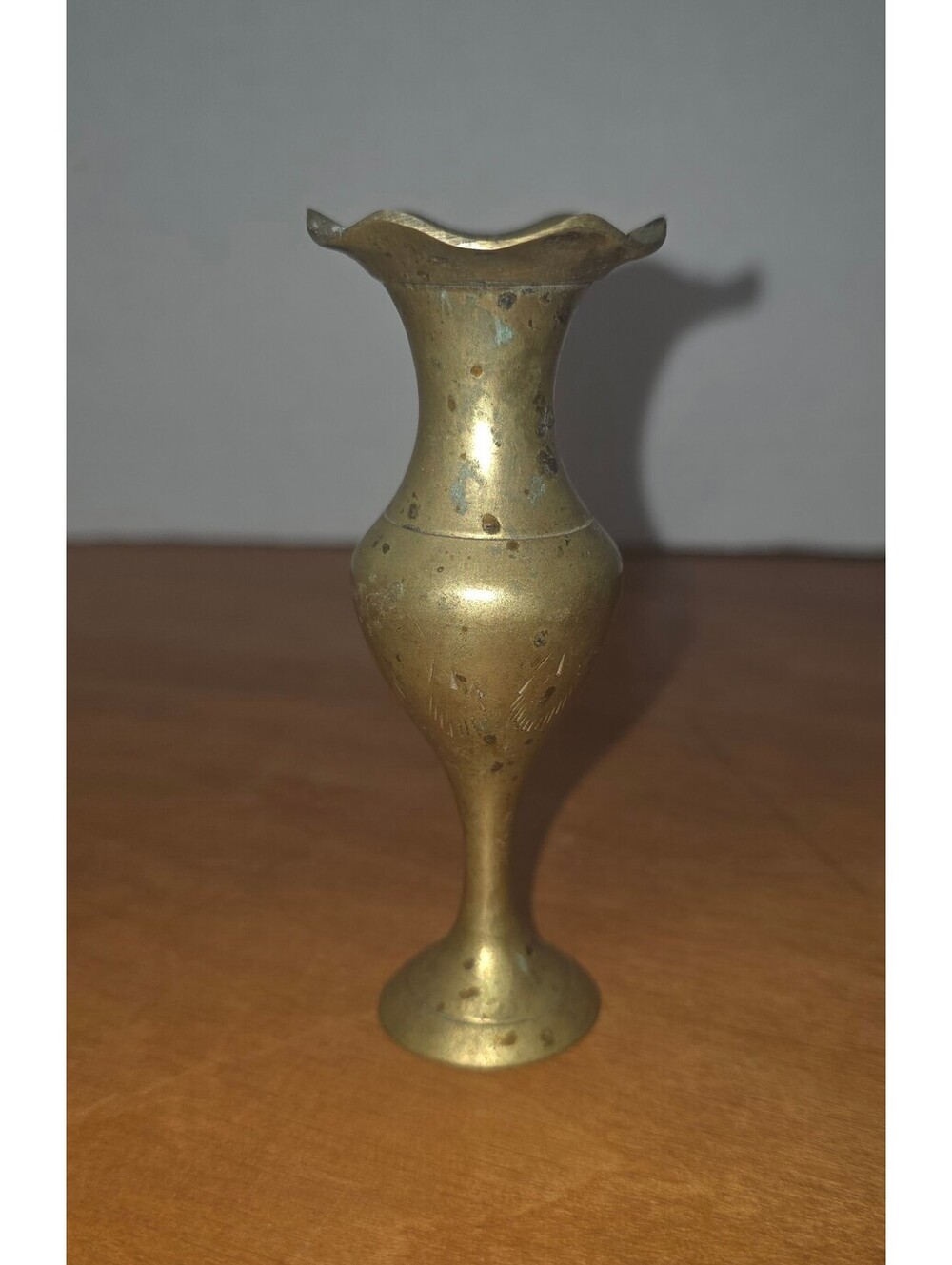 Small vintage solid brass butt face